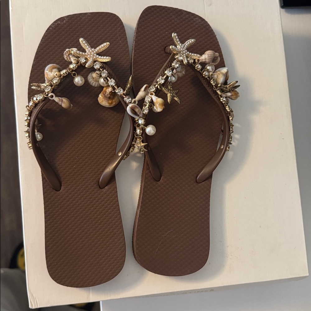 Embellished Brown Flip Flops with Seashells